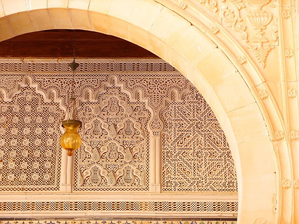 Detail of the intricate carved patterned arches and walkways of the Great Kairouan Mosque corridors in Tunisia saeidshakouri.com saeid shakouri